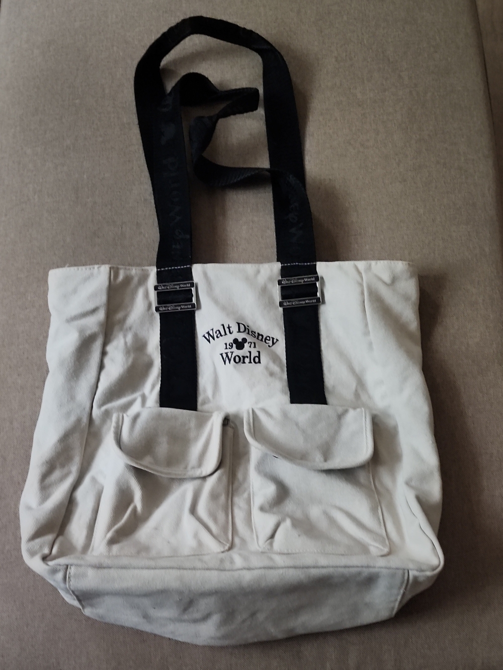 Disney Cream Canvas Tote with Black Straps and Front Pockets